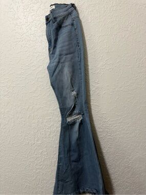 Vibrant Light Blue Distressed Bell Bottom Jeans